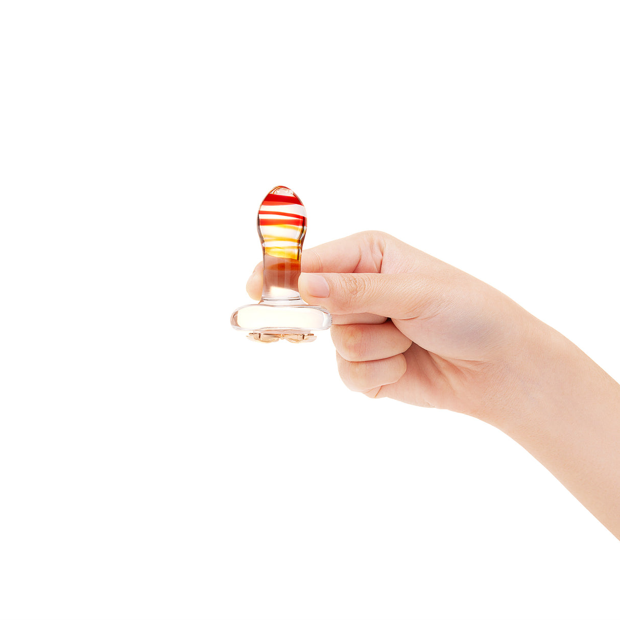 Hand holding the petite 2.75-inch plug to visually confirm its small, non-intimidating size.