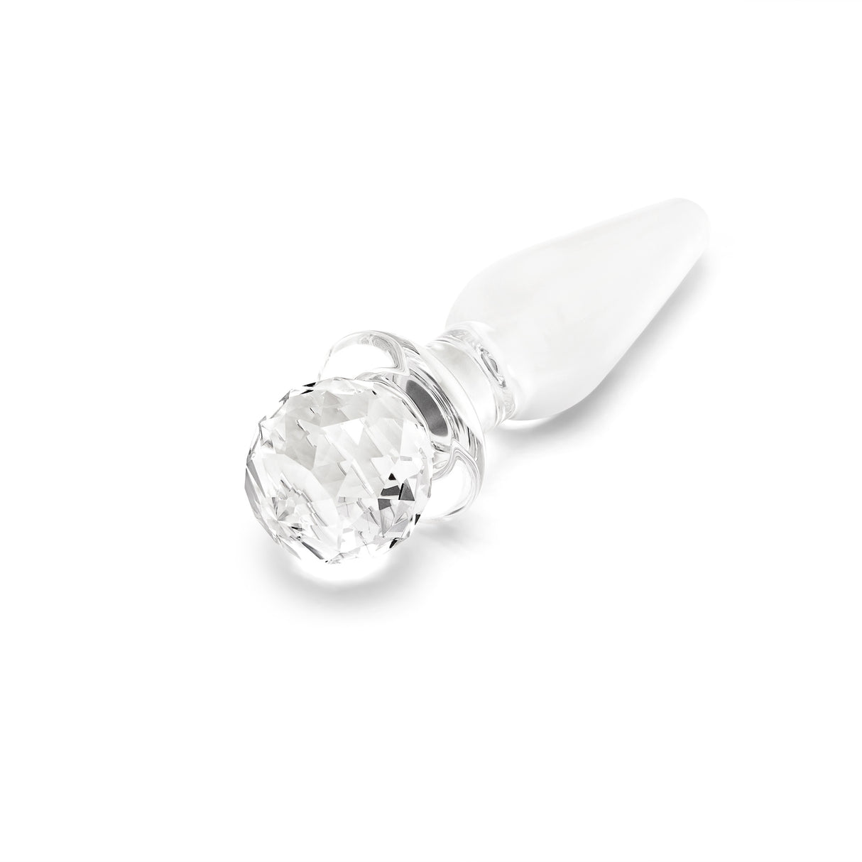 Glass anal plug with round base on a white background
