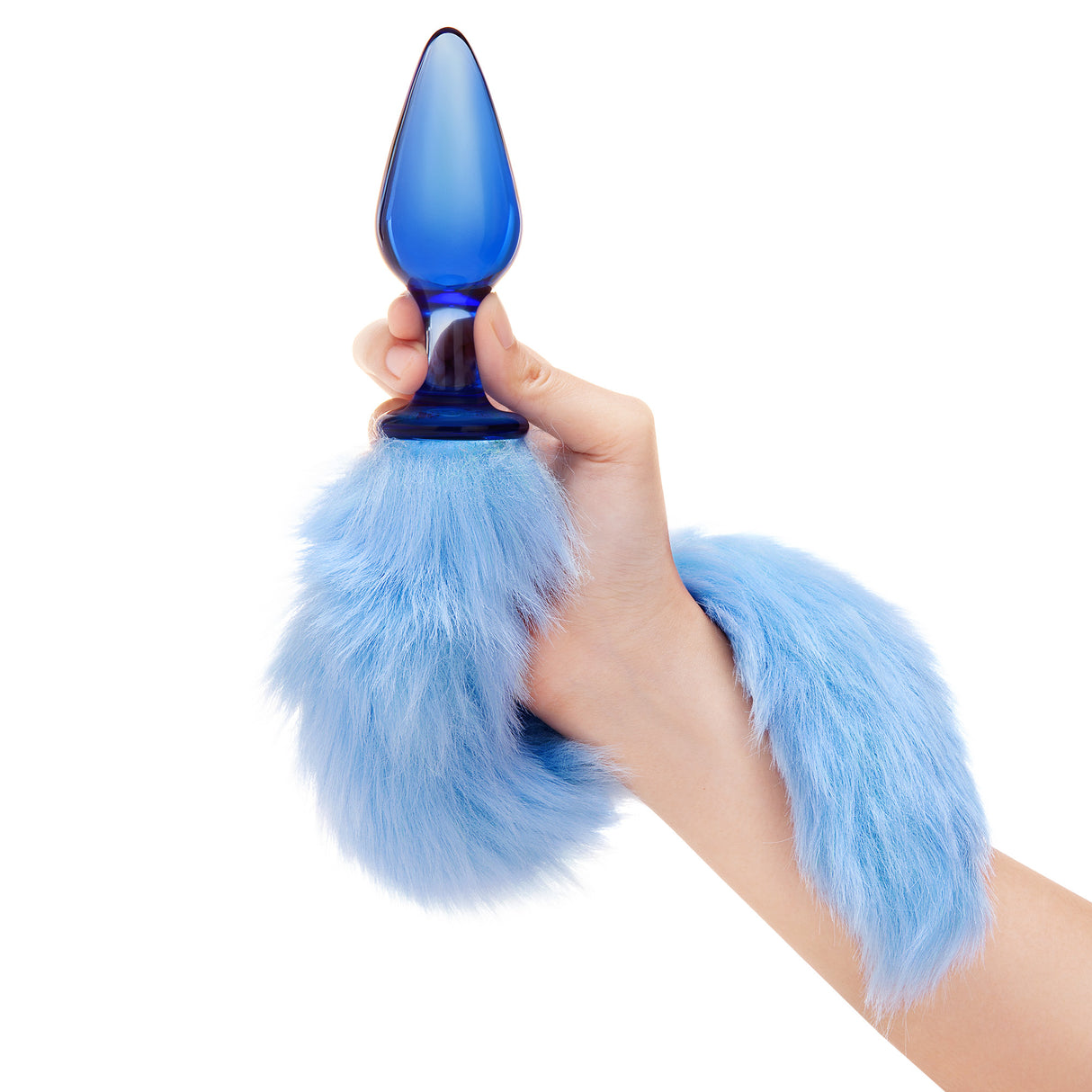 A hand holding the plug by the glass stem, showing the 4-inch insertable length relative to the fluffy tail.