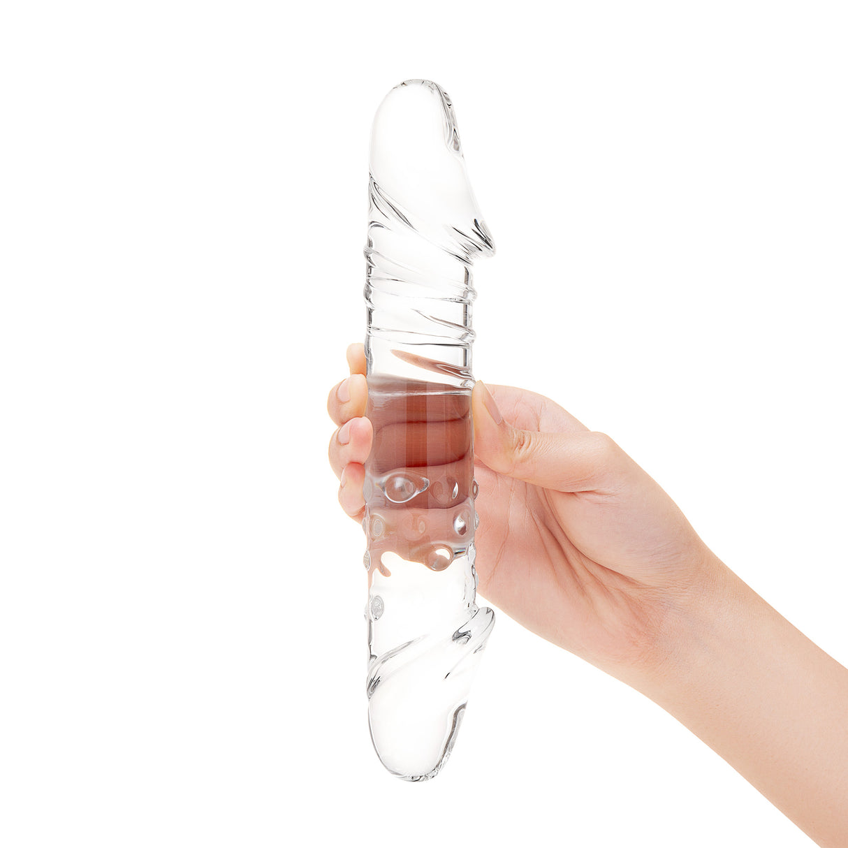 A hand gripping the center of the dildo, showing the substantial 8.75-inch length and the size of the dual ends.