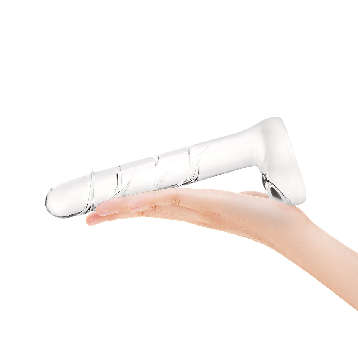Textured Curved Glass Dildo with rounded smooth tip and textured shaft held in a hand against a white background