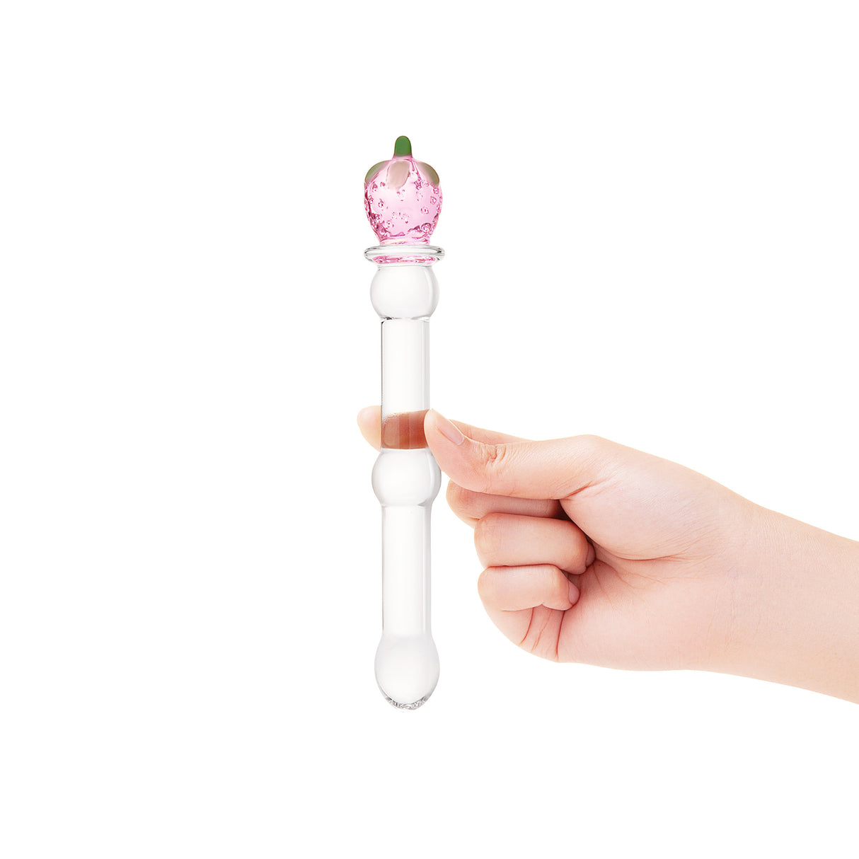 Hand holding a Strawberry Base Glass dildo featuring a rounded tip and a beaded mid-shaft body on a white background