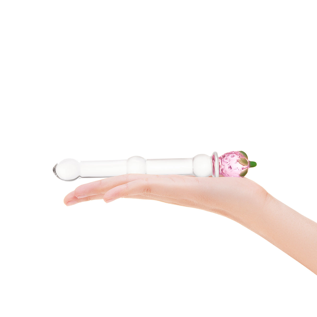 Strawberry Base Glass dildo featuring a rounded tip and a beaded mid-shaft body held in a hand on a white background