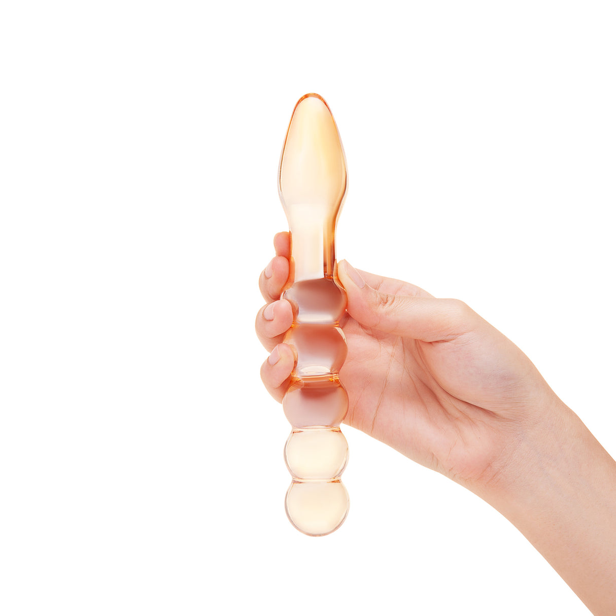 Hand holding a Dual-Ended Beaded Glass Dildo - smooth tapered end and a beaded shaft against a white background