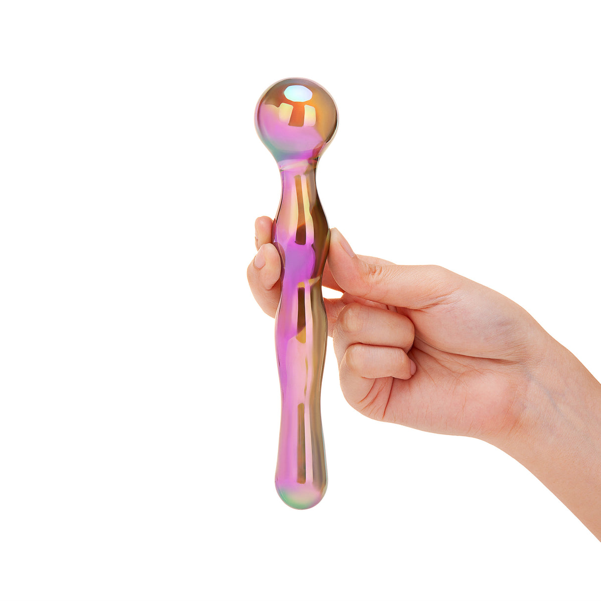 Hand holding a holographic dual-ended glass dildo with a beaded end, wavy center and a round base on a white background