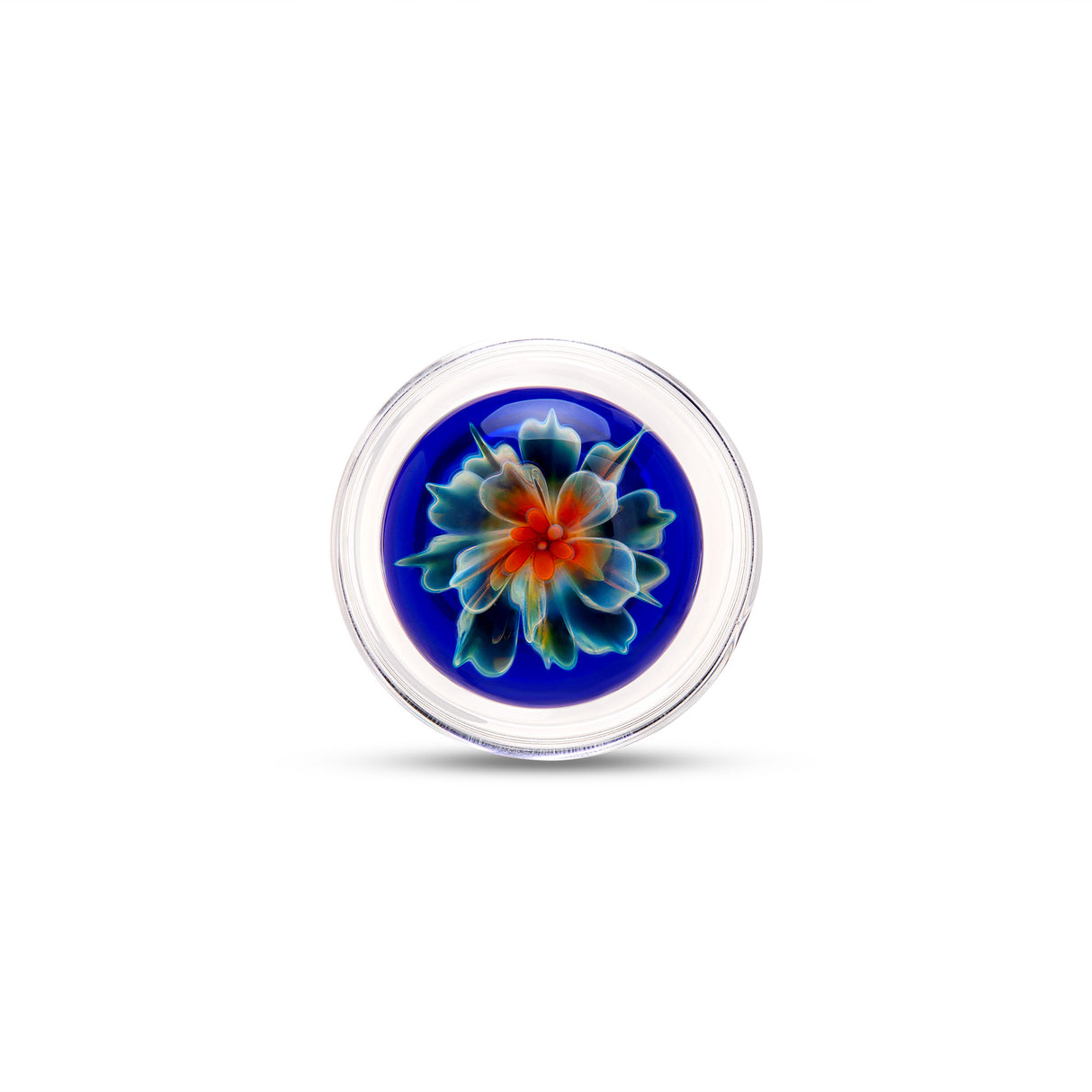 Round glass base with a floral design on a white background