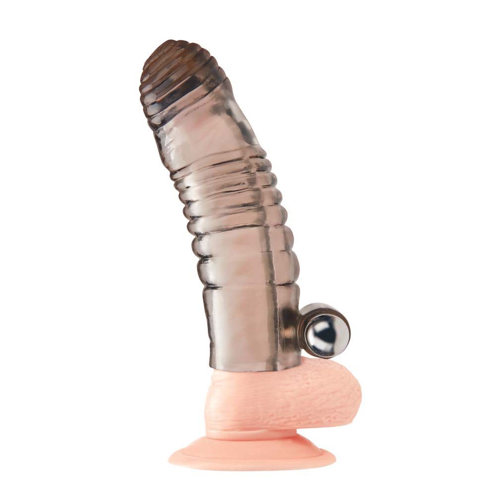 Dildo wearing the Blue Line 5.25" Vibrating Penis Enhancing Sleeve Extension
