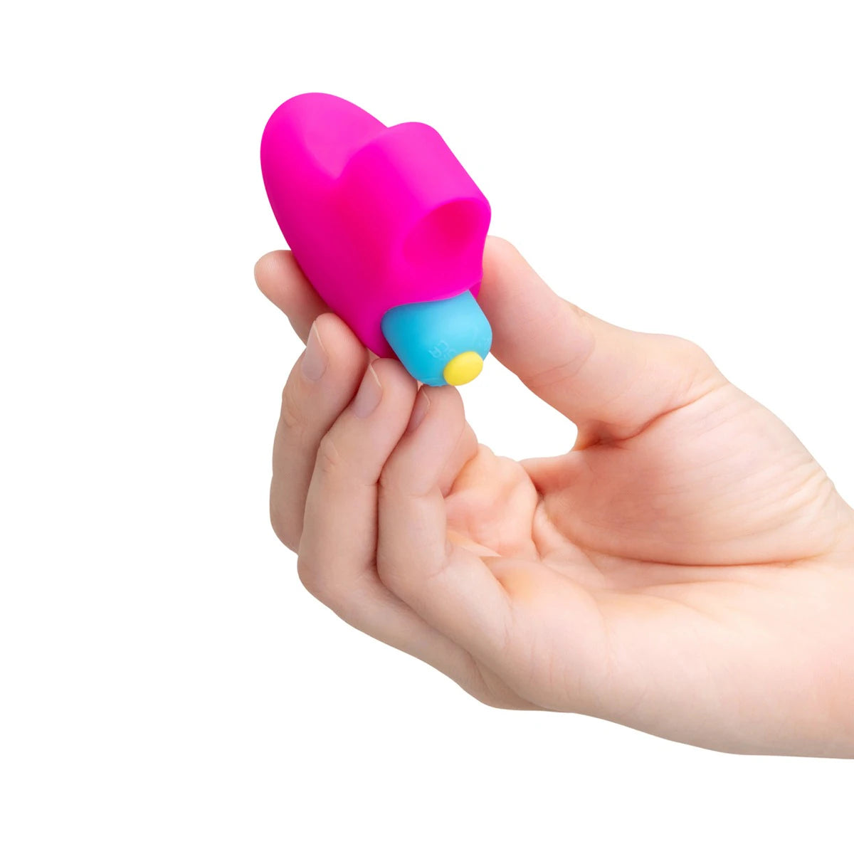 Hand holding the mini finger vibrator to show fit and scale.
