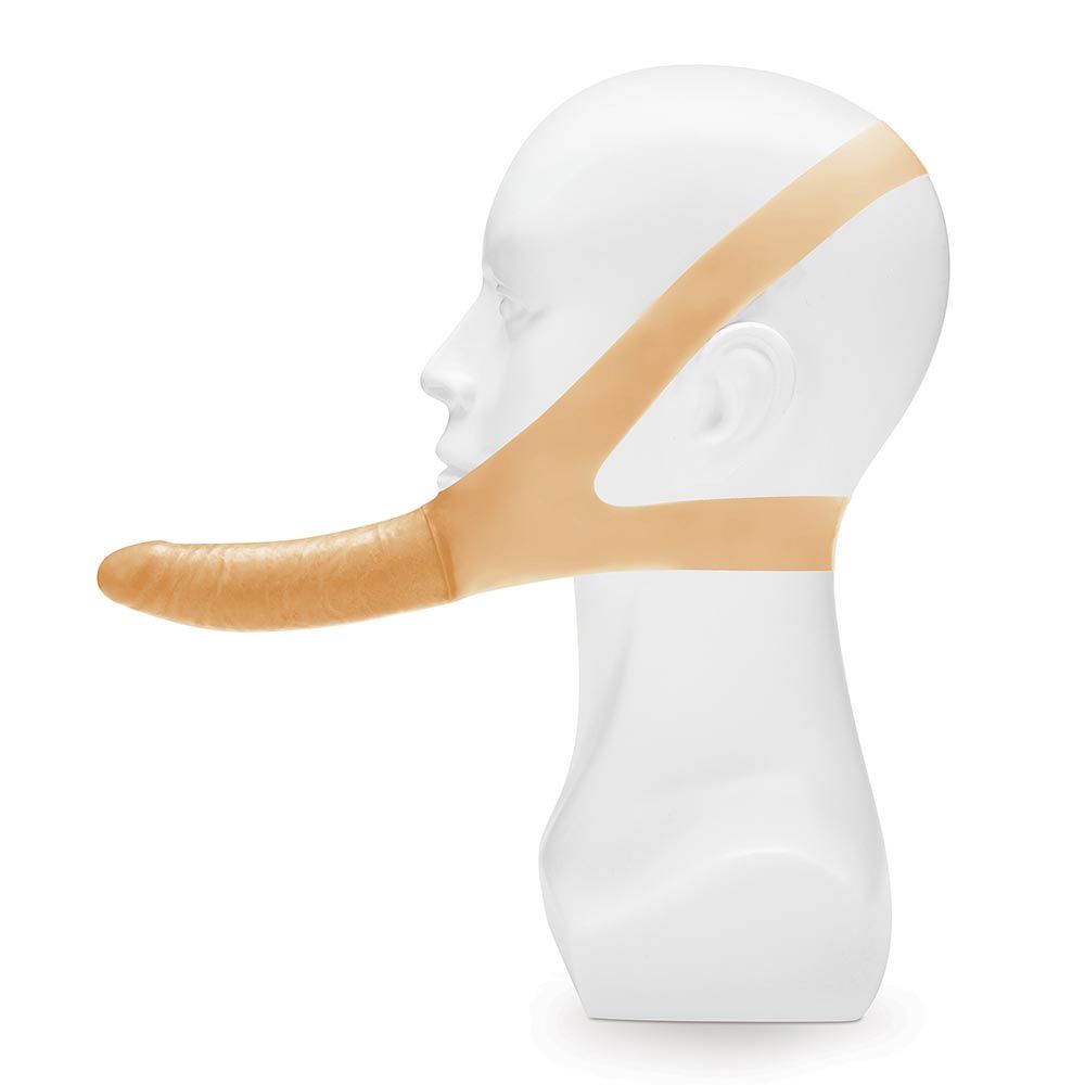 Horizontal side view of the Lux Fetish The Original Facilitator in Flesh Color