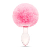 3.15" Pink Puff Tail Butt Plug Main View 3.15" clear borosilicate glass plug shown upright with a pink faux fur bunny tail.


