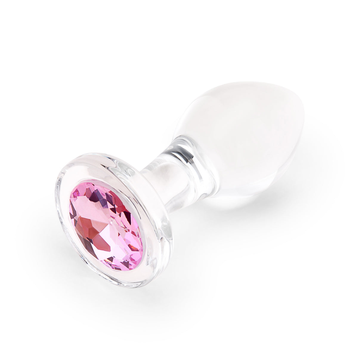 3.35" Pink Sparkle Butt Plug - Medium Side perspective displaying the smooth glass curves, classic tapered tip, and wide safety anchor.