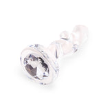 3.35" Twist and Tush Butt Plug - Small Detail View: Close-up of the flat, flared glass base highlighting the shining embedded gem.