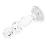 3.75" Twist and Tush Butt Plug - Medium Profile Angle: Diagonal side profile highlighting the slim neck resting above the flat, flared bottom.