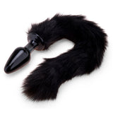 Profile Angle: Side view displaying the toy's classic tapered shape and sleek, opaque black glass body.