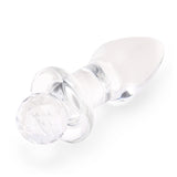 Detail View: Close-up of the flat, flared glass base highlighting the round, prism-like crystal grip.


