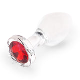 4" Cherry Sparkle Butt Plug - Large Close-up of the flared base highlighting the radiant red gem set into the flat bottom.