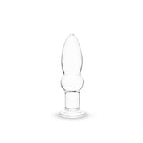 Clear glass anal plug on a white background