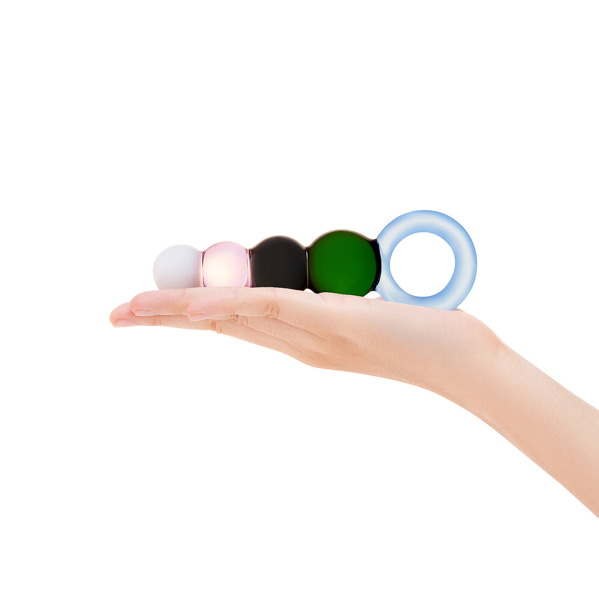 Hand holding a Beaded Glass Anal Plug  on a white background