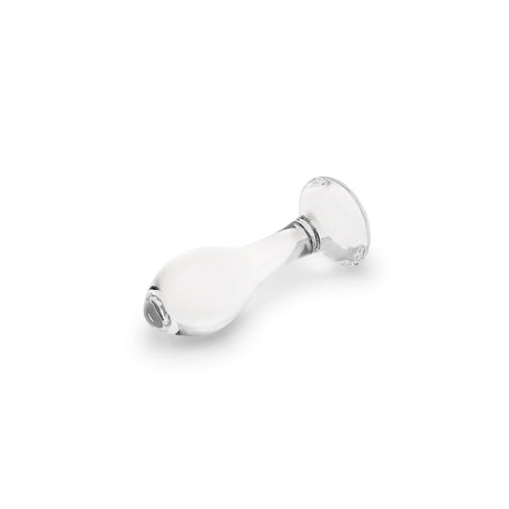 Clear glass anal plug on a white background