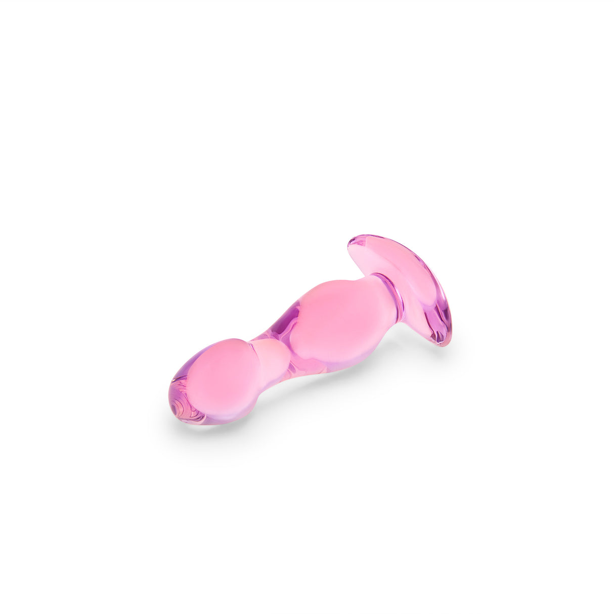 Pink anal glass plug on a white background