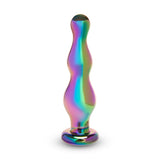 Multicolored glass anal plug on a white background