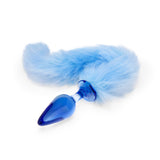 Blue butt plug with fluffy blue tail on a white background