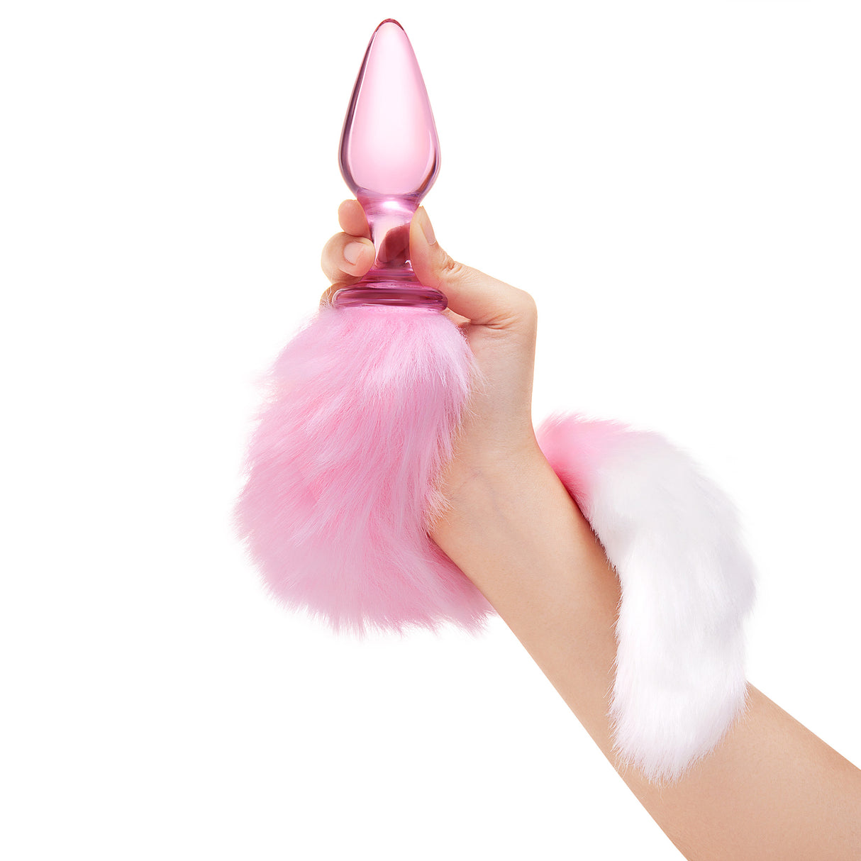 Pink Glass Tail Plug with fluffy tail held by a hand on a white background