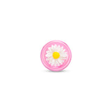 Pink glass anal plug base with a white daisy on a white background