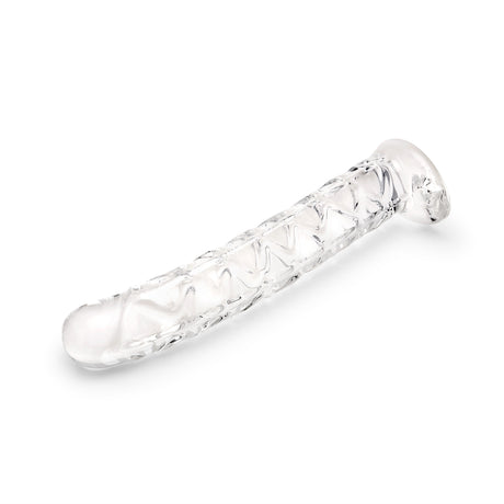 Clear Textured Glass Dildo on a white background