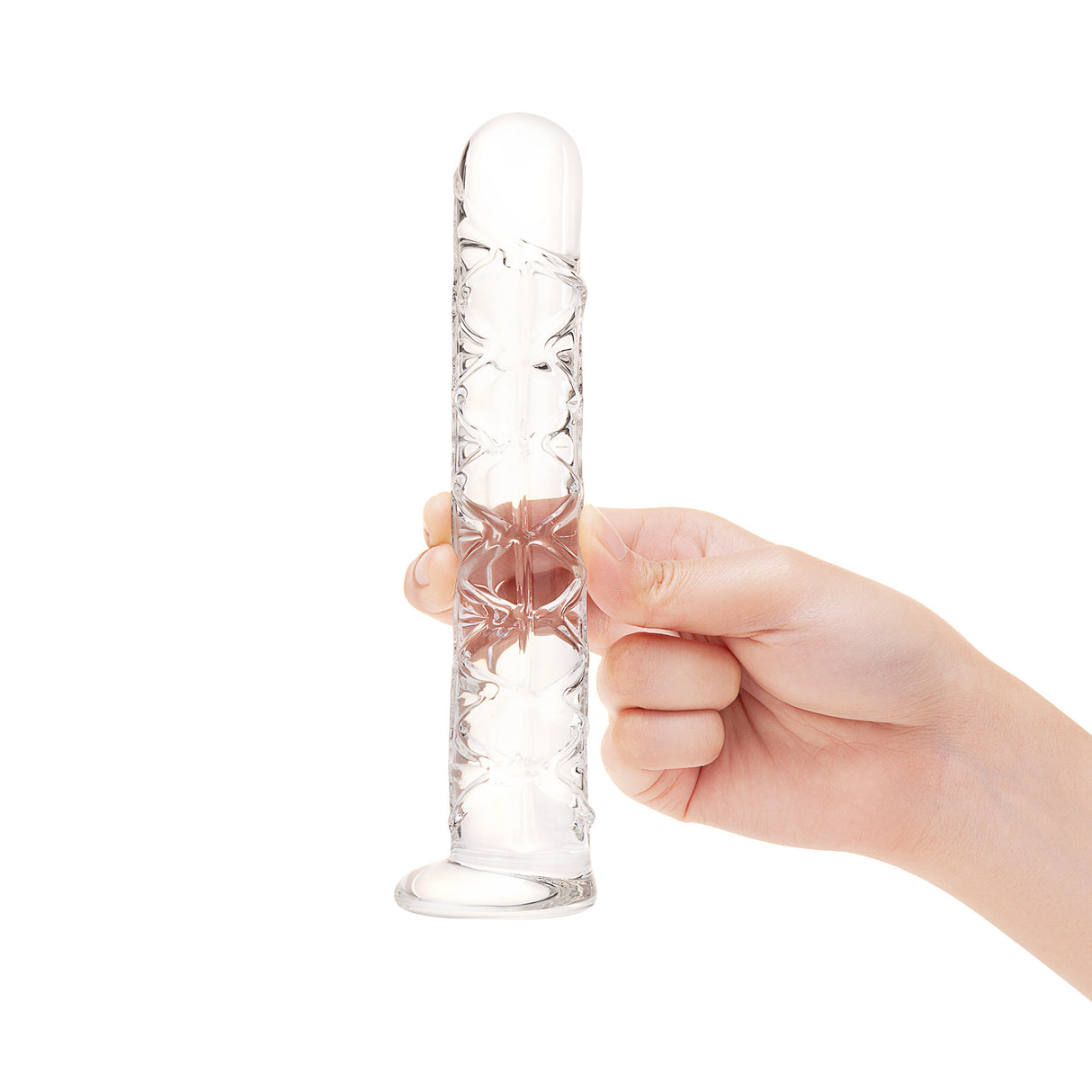 Clear glass Long Textured Glass Dildo held by a hand on a white background