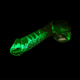 Glow-in-the-Dark lifelike Glass Dildo with swirl pattern  on a black background