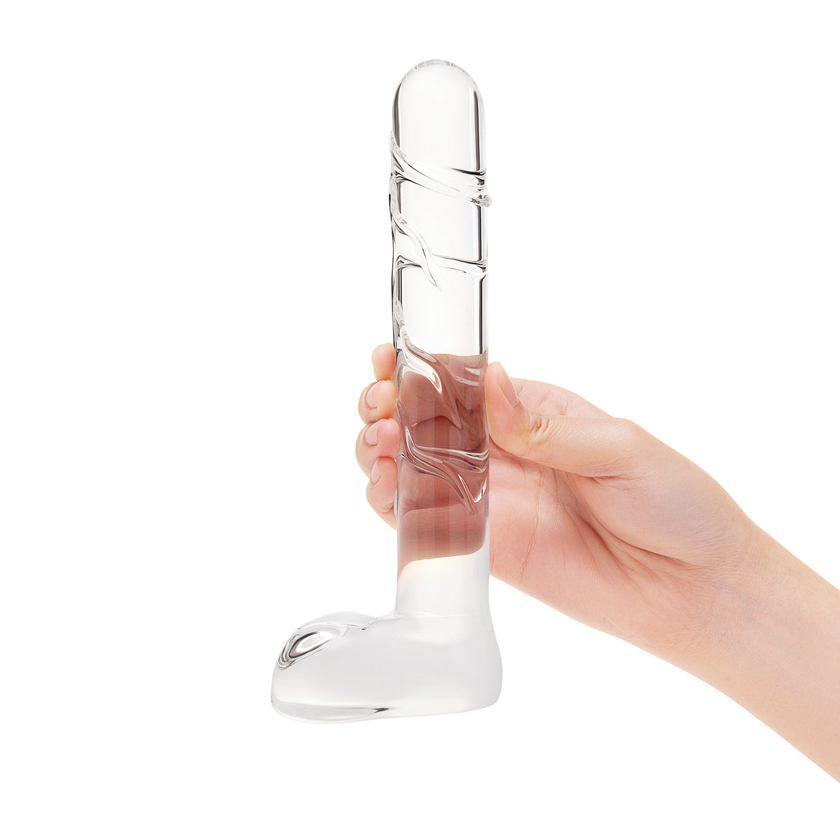 Textured Curved Glass Dildo with rounded smooth tip and textured shaft held by a hand on a white background