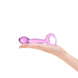 Purple Teardrop Tip & Ring Base dildo held in a hand on a white background
