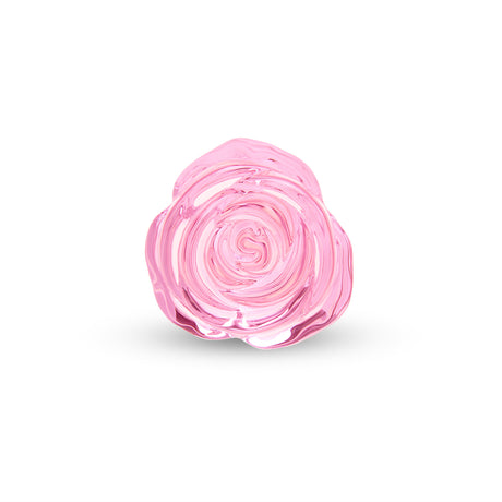 Pink rose-shaped butt plug base on a white background