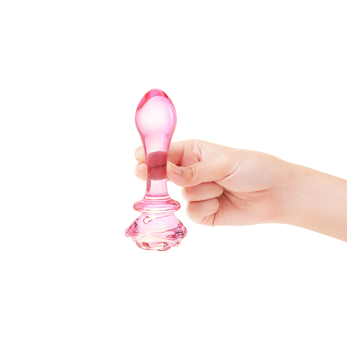 Pink Rosebud Glass Butt Plug held in a hand 