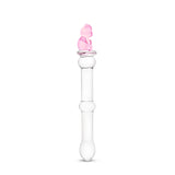 Sideview of a Clear beaded glass dildo featuing a tapered tip and cute pink bear base on a white background