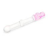 Clear beaded glass dildo featuing a tapered tip and cute pink bear base on a white background