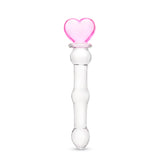 beaded glass dildo featuring a pink heart base and mid-shaft bead on a white background