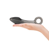 Bulbous Teardrop Tip Glass Dildo  held in a hand on a white background