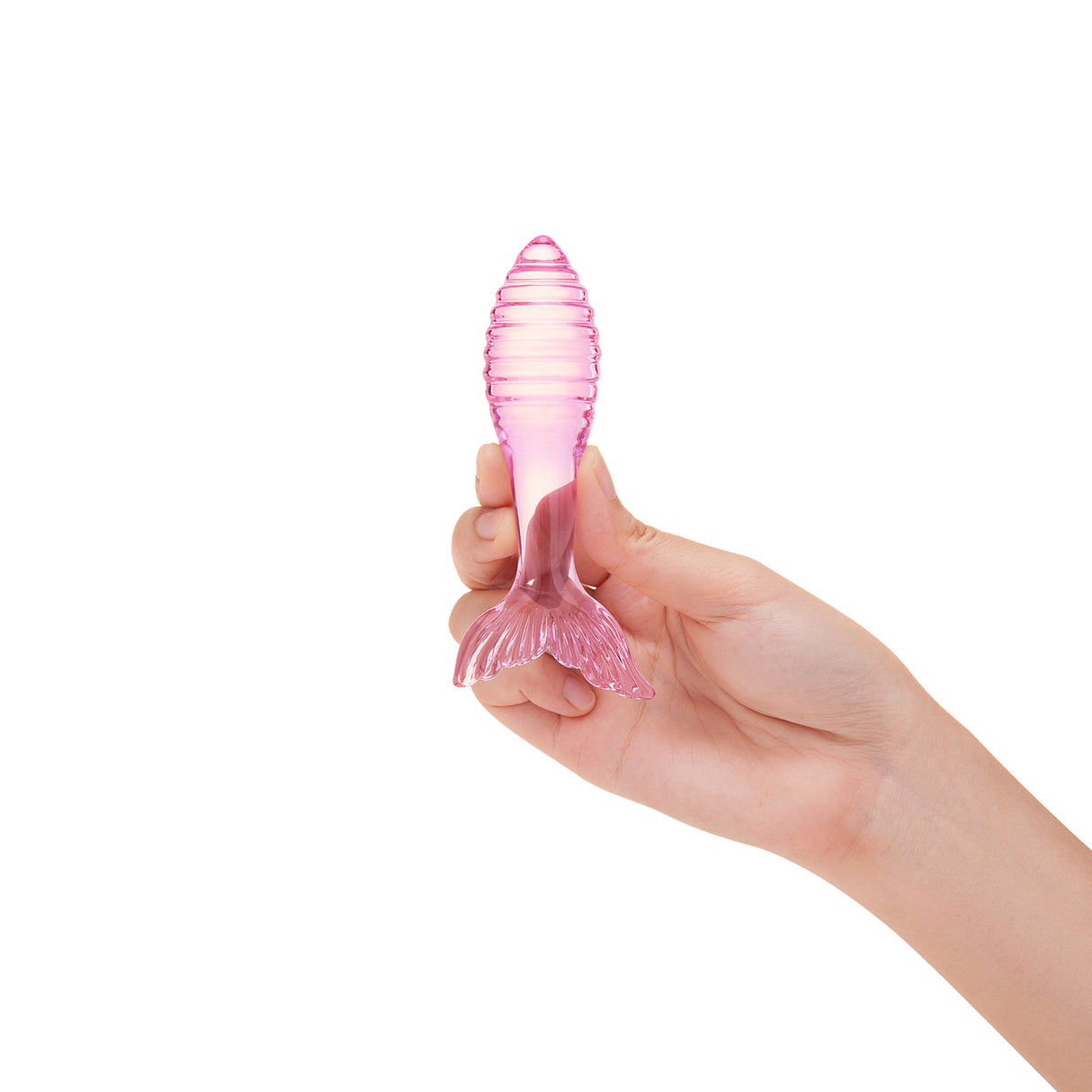 Pink Mermaid Tail - Ridged Glass Anal Plug held in a hand against a white background