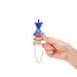 Hand holding a cUnicorn Handle Glass Plug on a white background