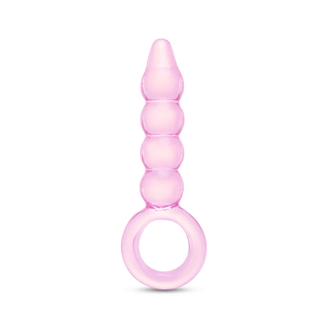 Pink glass anal plug with beaded shaft, tapered tip and ring base on a white background