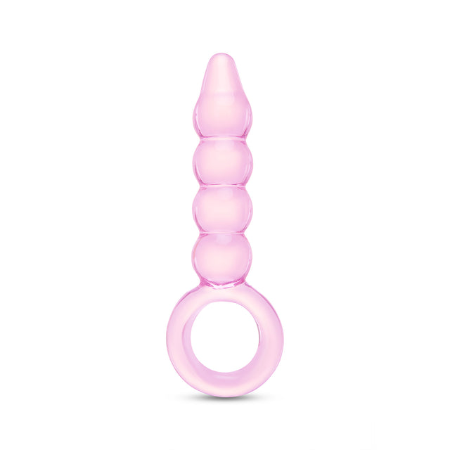 Pink glass anal plug with beaded shaft, tapered tip and ring base on a white background