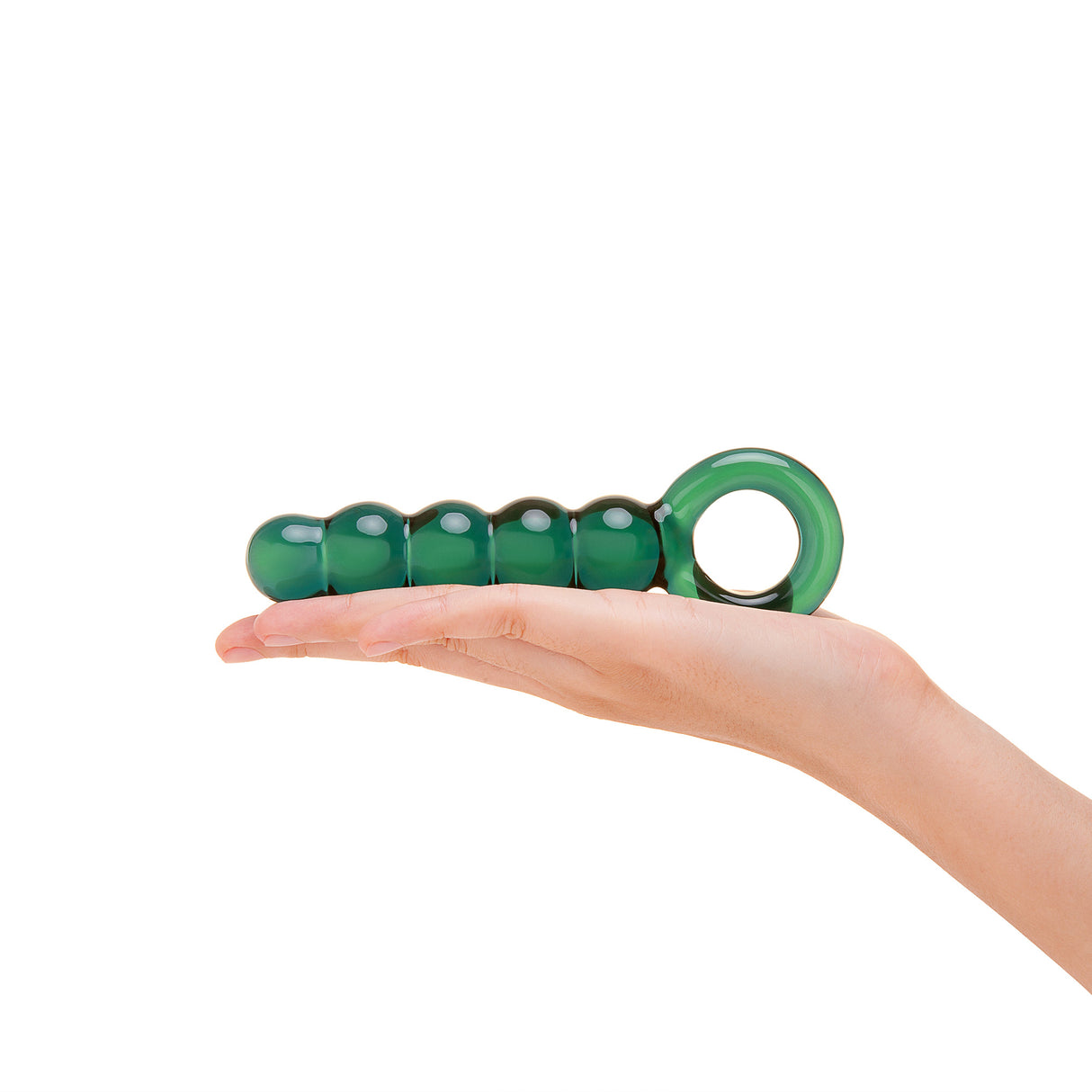 Green Beaded Glass Anal Plug held in a hand on a white background