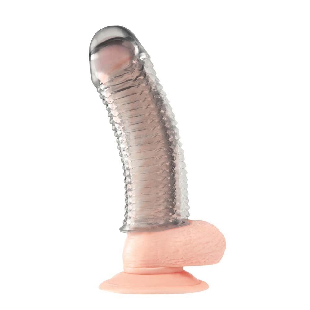 Dildo wearing the Blue Line 6.5" Clear Textured Penis Enhancing Sleeve Extension