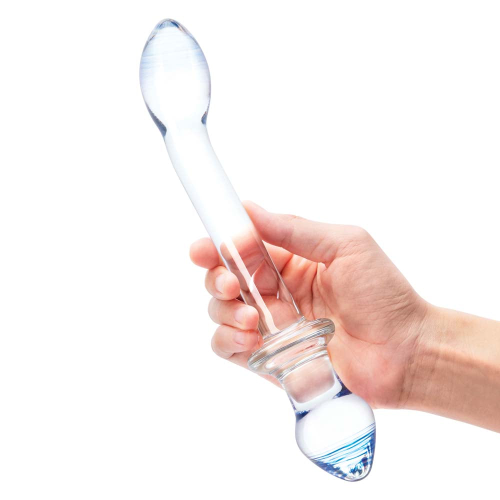 Model holding the Gläs 9.5" Double Play Dual-Ended Dildo