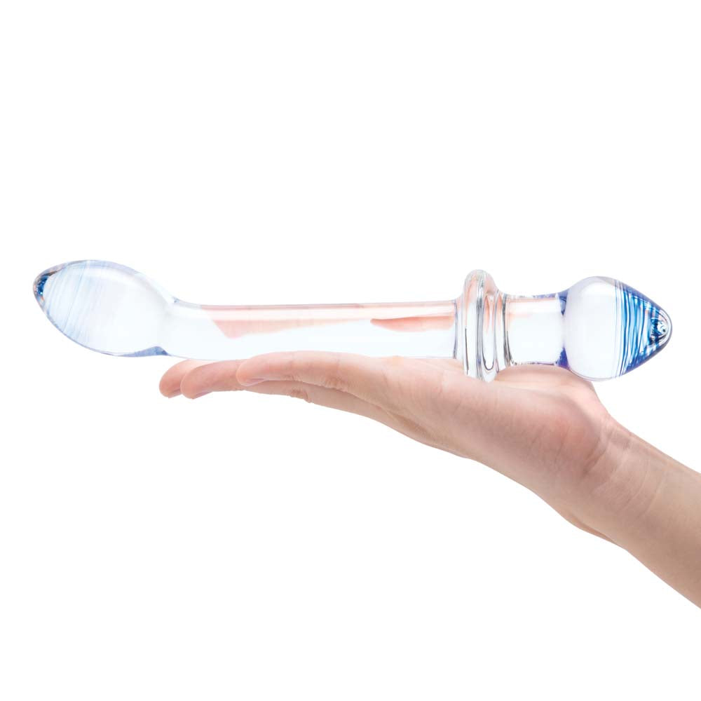 Horizontal view of model holding the Gläs 9.5" Double Play Dual-Ended Dildo