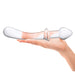 Horizontal view of model wearing the Gläs 9" Classic Curved Dual-Ended Dildo