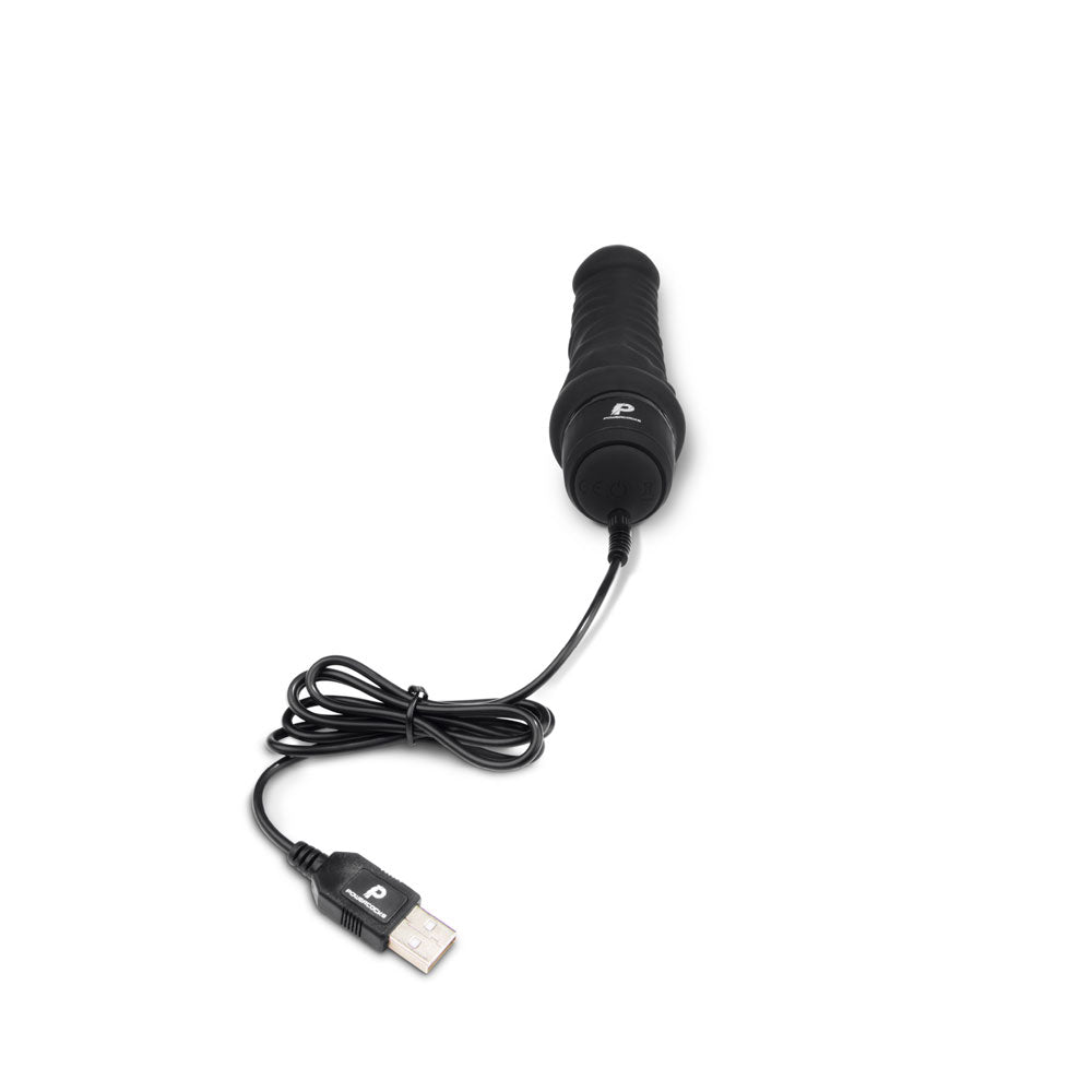 USB pin charger plugged into the charging port located at the bottom of the Powercocks 6" Realistic Vibrator in Black color